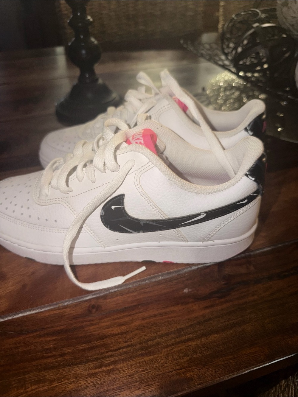 Nike White Leather Sneakers with Black Marble Swoosh and Pink Tongue Detail